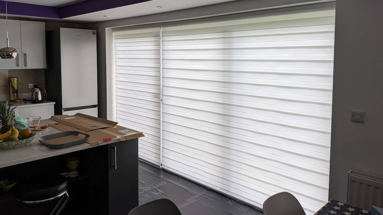 Modern kitchen with roller blinds