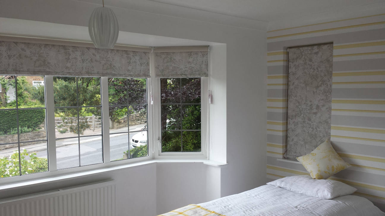 Home office with stylish roller blinds