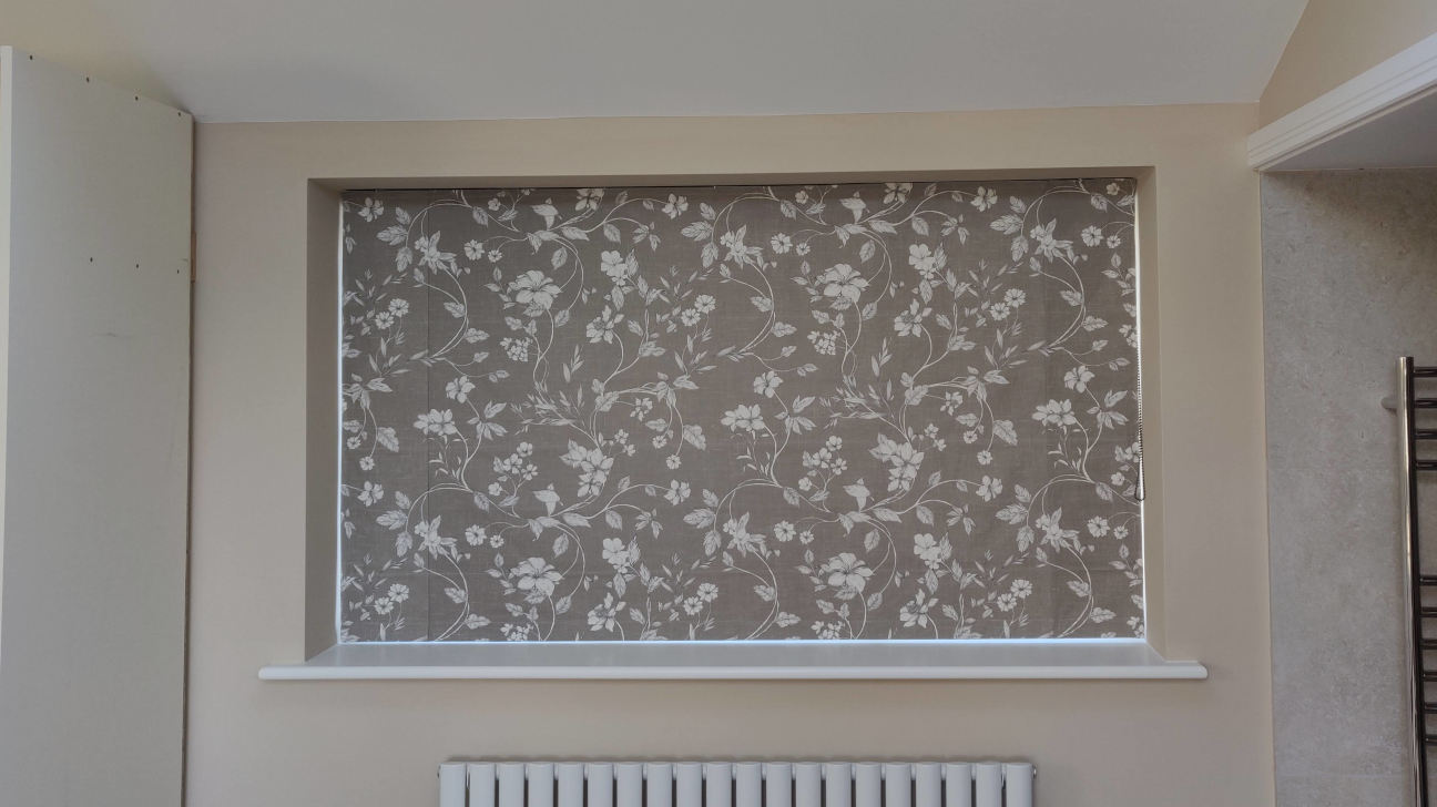 Kitchen with elegant custom Roman blinds