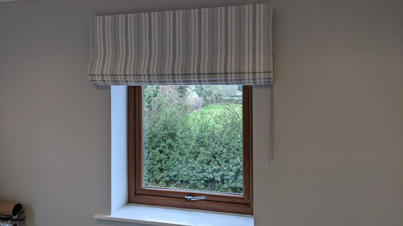 Home office with functional custom Roman blinds