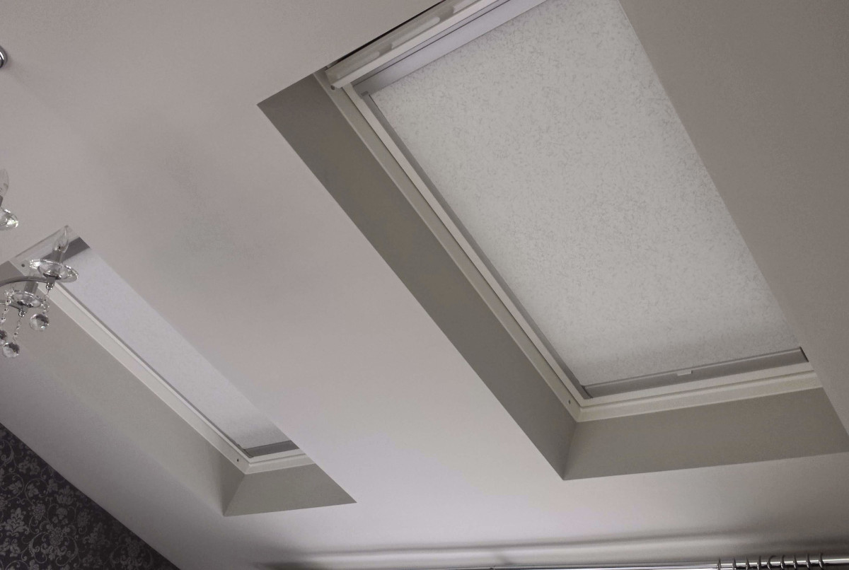 Custom skylight blind in a modern loft space