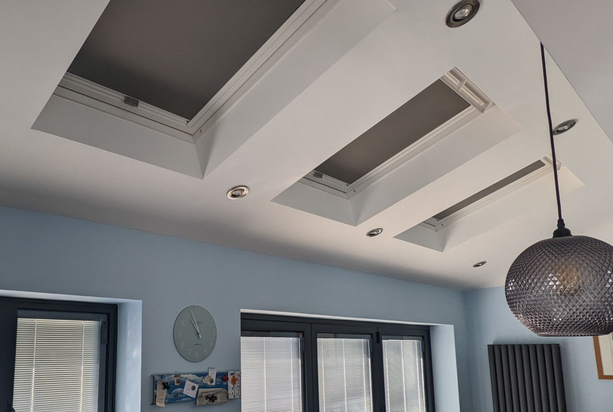 Custom skylight blind in a bay window