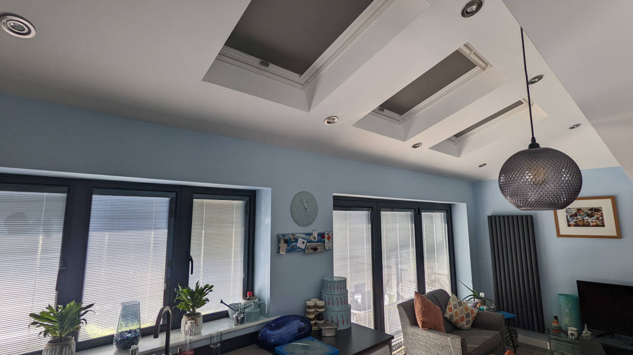 Loft room with custom skylight blinds