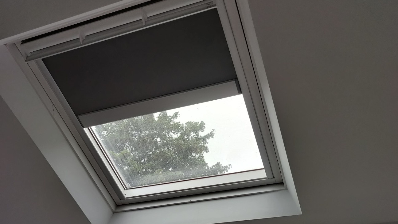 Living area with custom skylight blinds