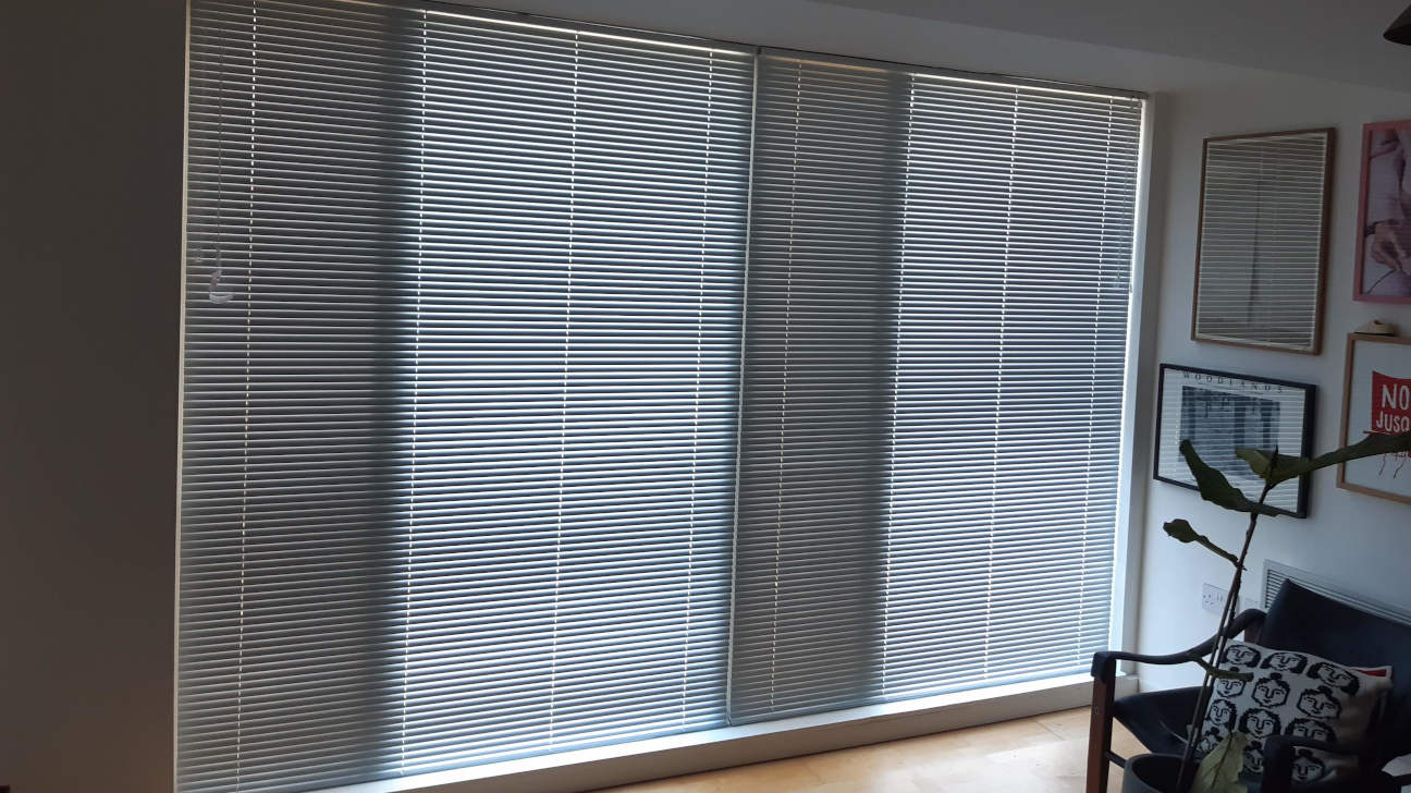 Modern living room with custom venetian blinds