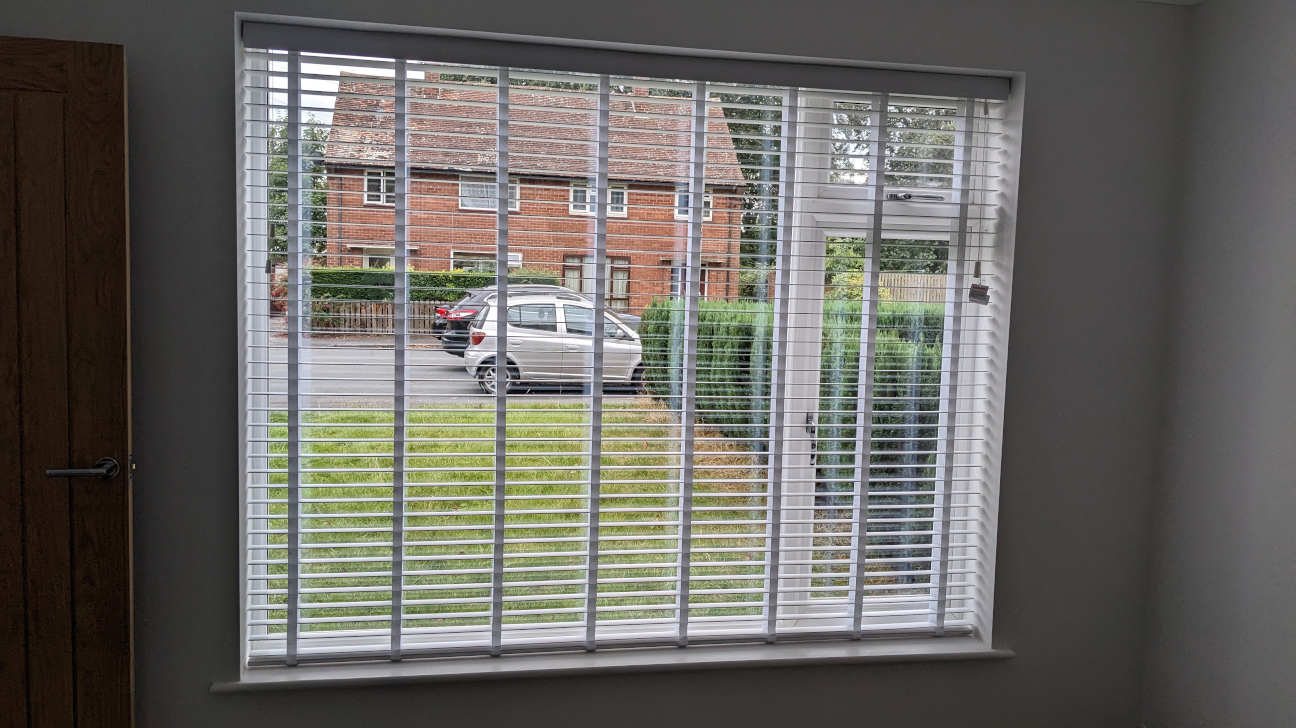 Modern living room with custom venetian blinds