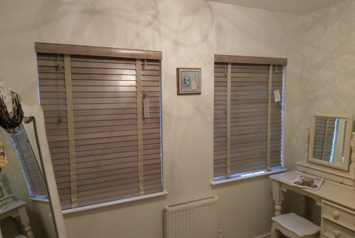 Wood Venetian Blinds in a Bedroom