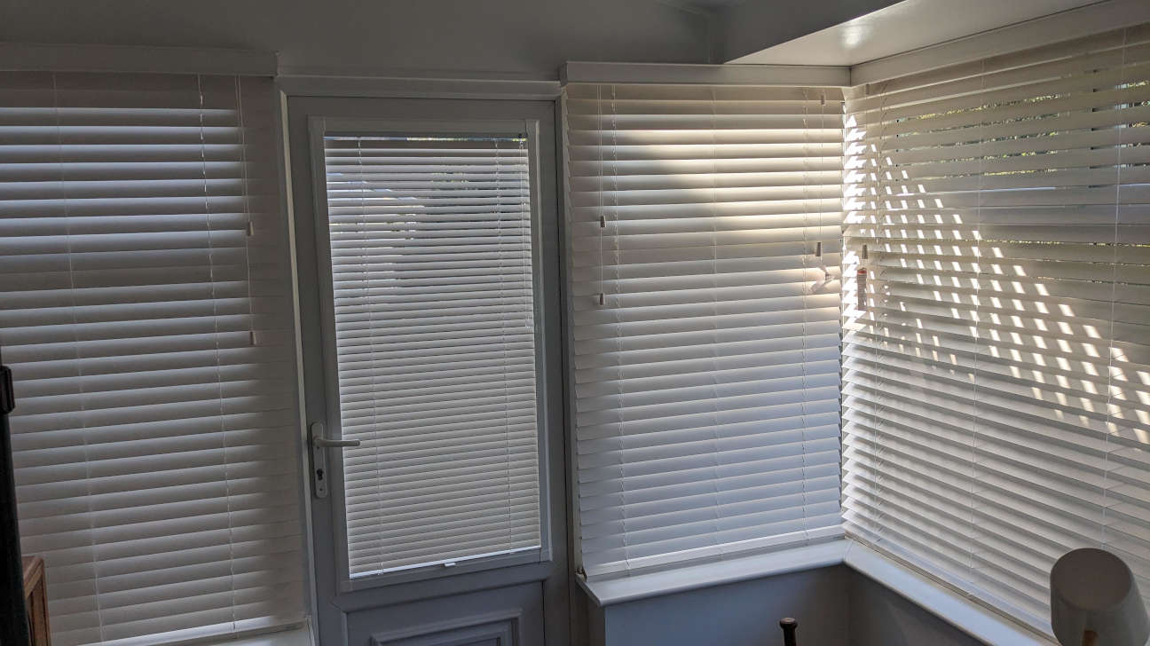 Modern living room with custom venetian blinds
