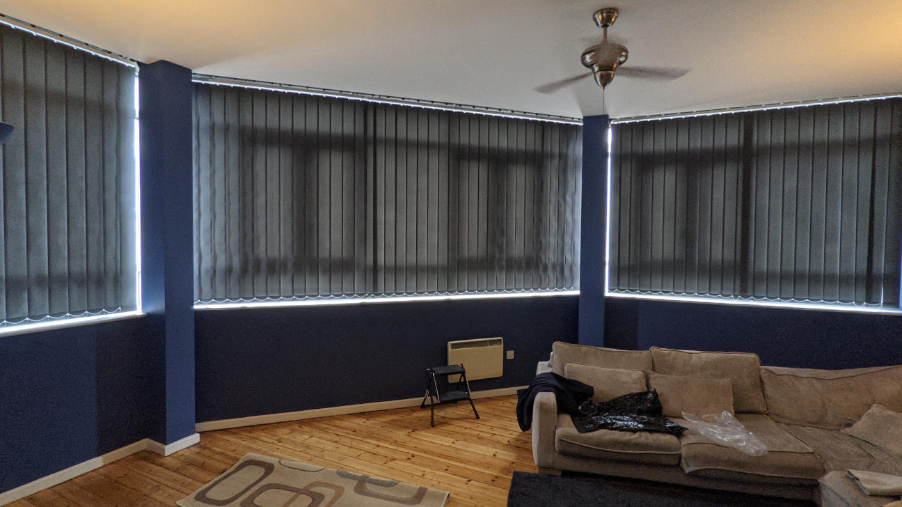 Modern living room with custom vertical blinds