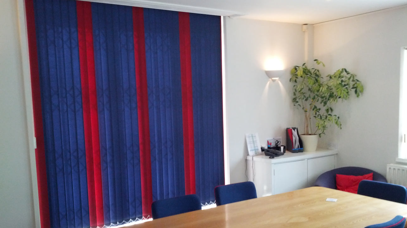 Living room showcasing vertical blinds